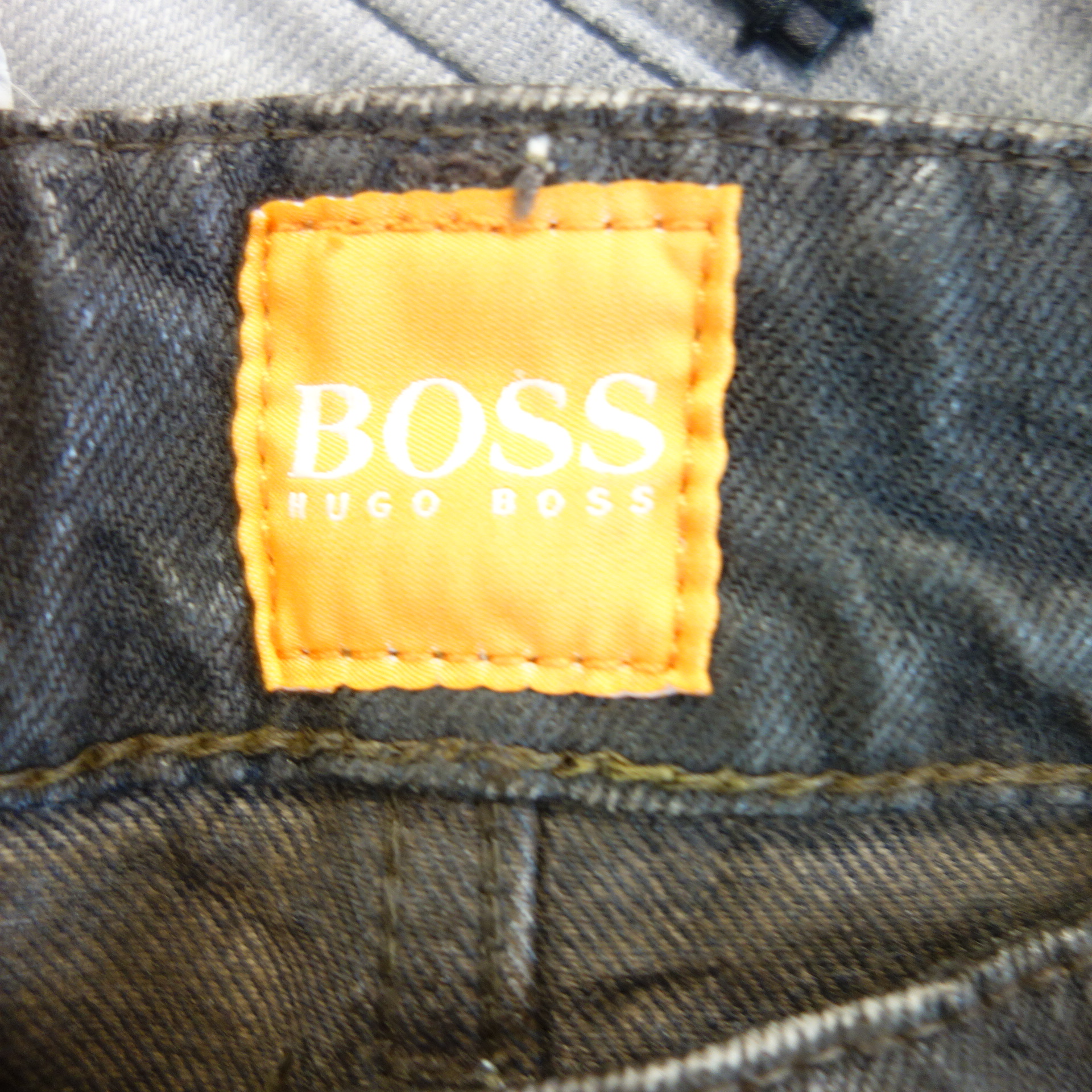 HUGO BOSS Herren Jeans Hose Jeanshose Coating Braun Oslo Slim Fit Lederlook